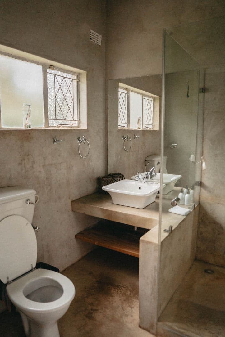 Indoor bathroom with shower at The Art House