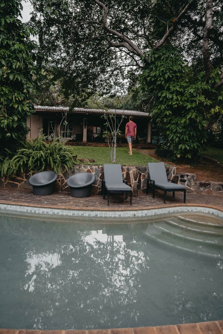 Private swimming pool and garden at The Art House, Victoria Falls