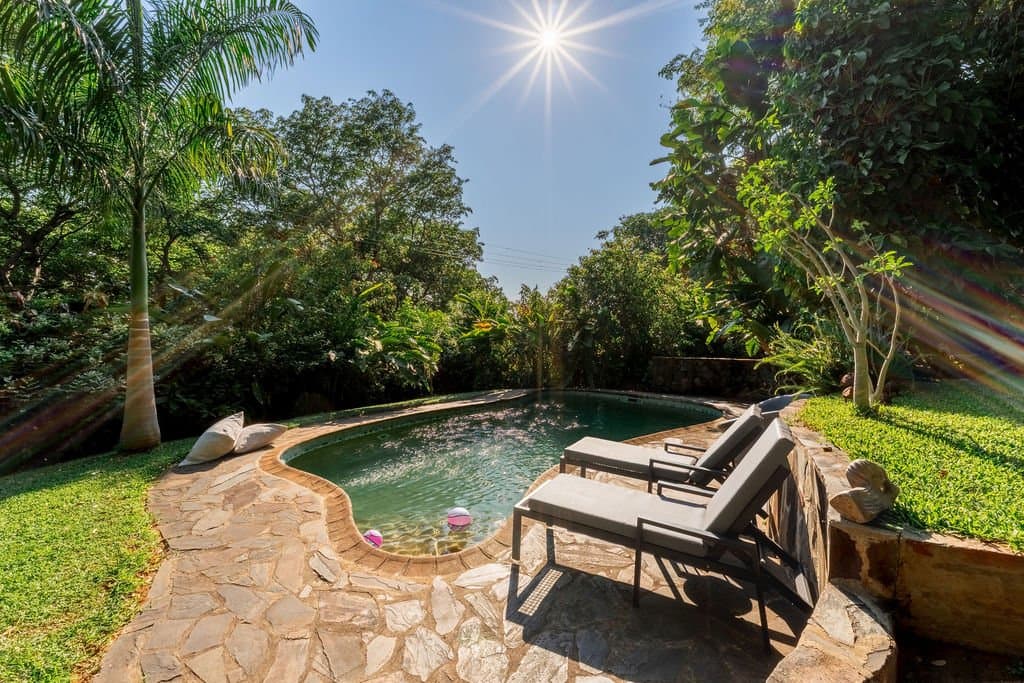 Private swimming pool with loungers